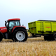 This is a tractor and a trailer. Photo credit: Martin Pettitt/Wikimedia Commons. NOTE: Not the actual tractor and trailer used. Every photo we found was sad and Irish and glum and a poorly composed shot. Isn’t this much nicer? There’s a tweet with the actual trailer below. Enjoy it.